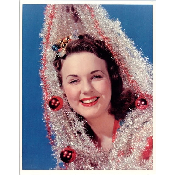 Deanna Durbin in Christmas spirit with tinsel smiling 8x10 inch photo