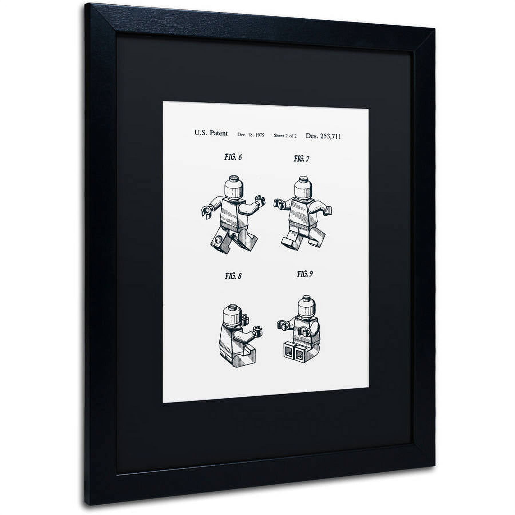 Trademark Fine Art "Lego Man Patent 1979 Page 2 White" Canvas Art by Claire Doherty, Black Matte, Black Frame