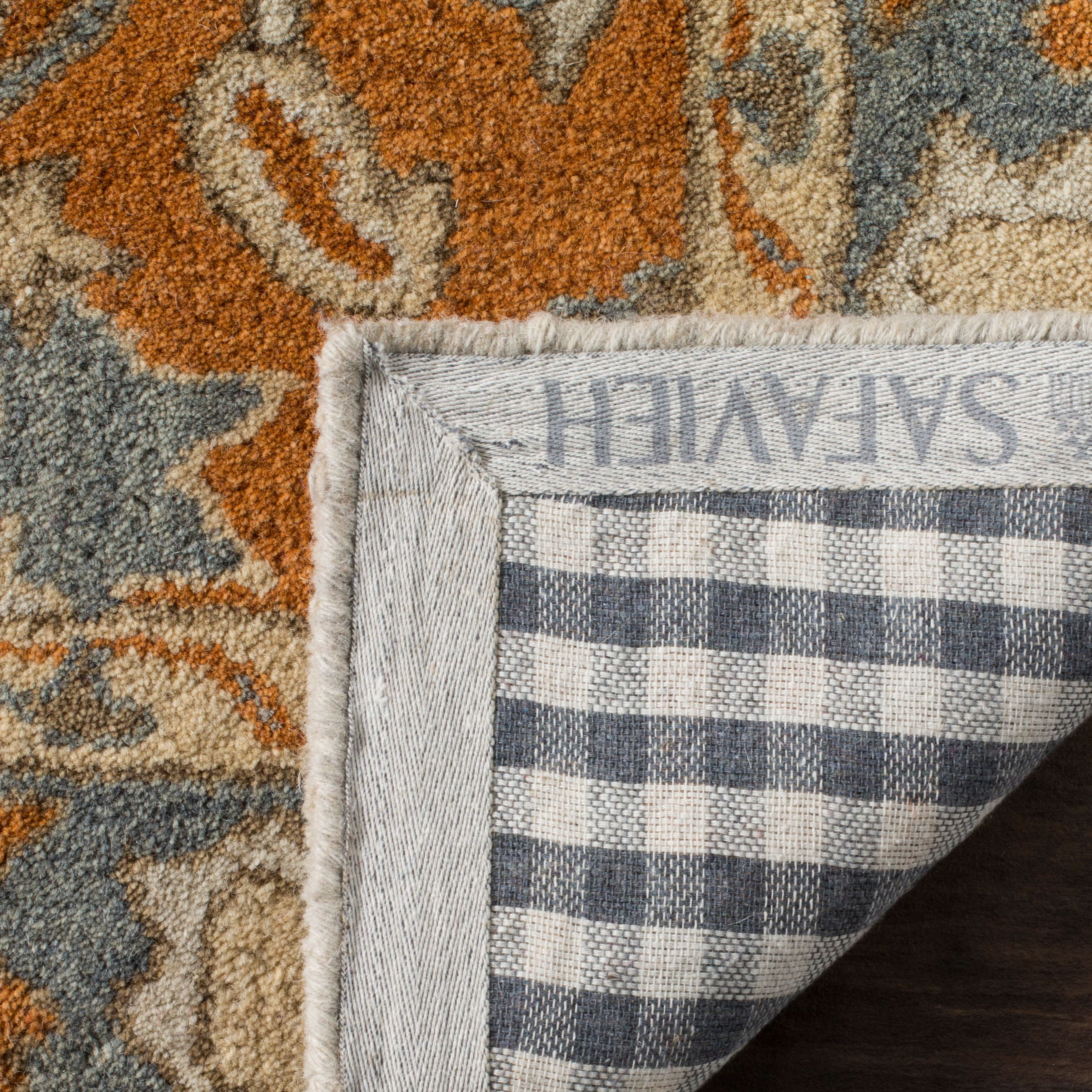 SAFAVIEH Heritage Nita Traditional Wool Area Rug, Light Blue/Rust, 5' x 8'