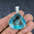 thumbnail image 2 of Adidev 30 Carat Blue Topaz Gemstone Triangle ShapeSky Blue Color 925 Sterling Silver Pendant for Women, 2 of 5