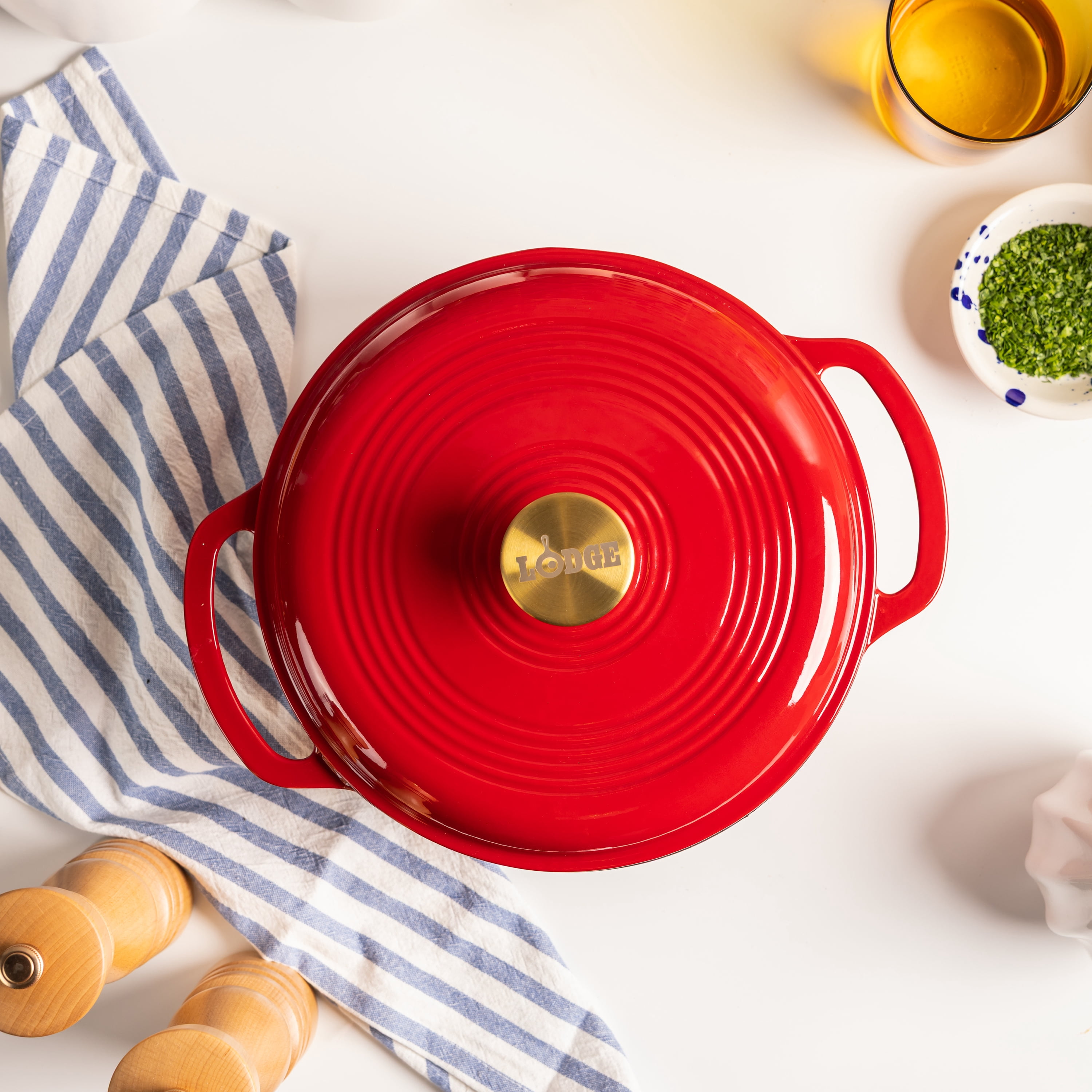 Lodge 4.5 Quart Enameled Cast Iron Dutch Oven with Lid – Dual Handles – Oven Safe up to 500° F or on Stovetop - Use to Marinate, Cook, Bake, Refrigerate and Serve – Ruby with Gold Knob