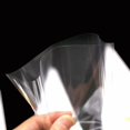 thumbnail image 3 of Bolsa de dulces, bolsa de plástico de cono transparente de 100 piezas con 100 lazos giratorios, embalaje de celofán para dulces, galletas, regalos de fiesta, 18*37 cm, 3 of 4