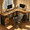 Brown, variant on Lofka 66" L-Shaped Gaming Desk with Power Outlets, Home Office Computer Desk with Drawers - Black