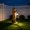 Orange, variant on A brown bear statue welcoming guests, a garden statue with solar-powered lights, a 19-inch resin bear family in a tree, and outdoor bear decorations for courtyards, gardens, lawns, and patios.