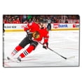 thumbnail image 1 of Patrick Kane 20x29 Framed Canvas Blackhawks Red-H Skating, 1 of 4