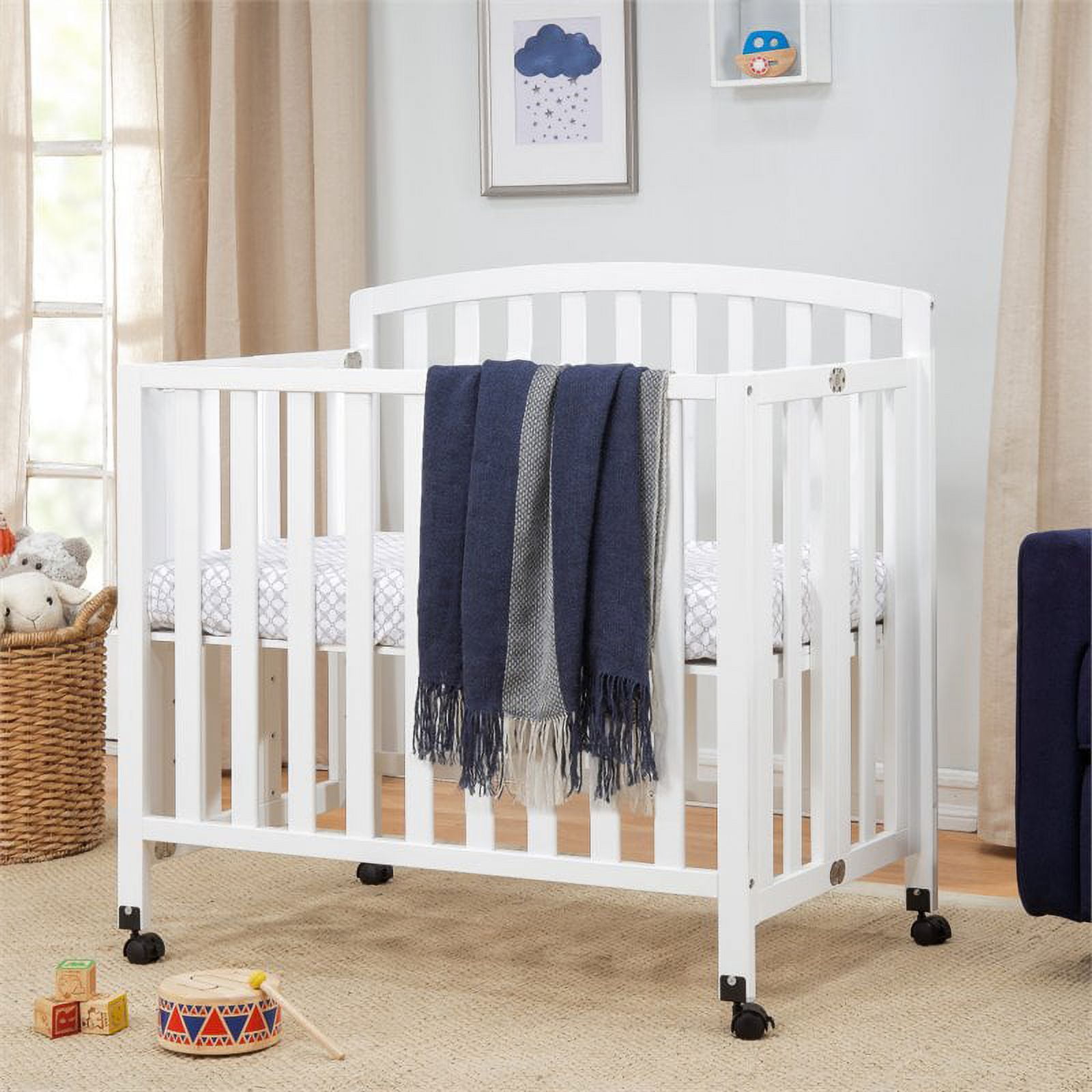 DaVinci Dylan Folding Portable 3-in-1 Mini Crib and Twin Bed in White
