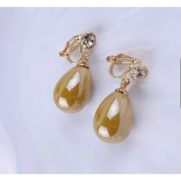 Clip on 1 1/4"gold and shiny green dangle teardrop bead earrings