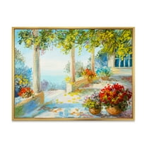 Designart 'Terrace With Red Flowers Near The Sea' Nautical & Coastal Framed Canvas Wall Art Print