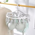 thumbnail image 4 of Percha Plegable Giratoria Para Secar Ropa Con 24 Pinzas gris, 4 of 5