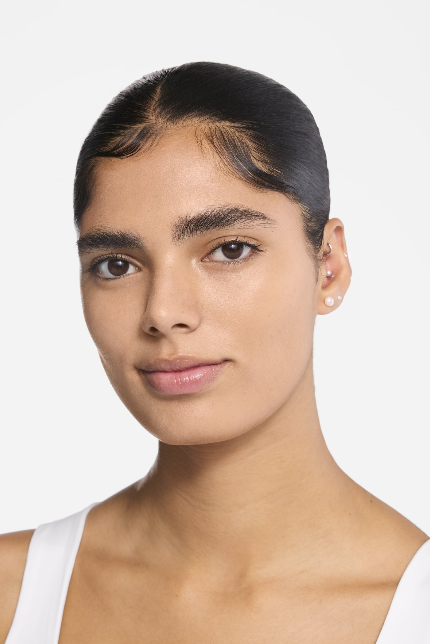 Revolution Skin Silk Radiant Serum Concealer, Buildable Coverage, Tan Golden, 0.13 oz