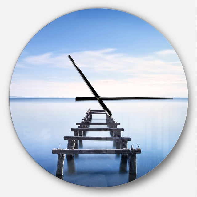 DesignArt Jetty Remains in Blue Lake Large Wall Clock