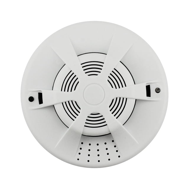 detector de humo inalámbrico interconectado fotoeléctrico humo y temperatura combo alarma 9v yeacher — vista frontal centrada de unidad blanca circular de ABS con rejilla de detección fotoeléctrica en el centro, cinco aletas radiales cruzadas, orificio de sirena inferior perforado y dos ranuras de montaje; funciona con pila 9V (no incluida), tamaño aprox. 10.7 x 3.5 cm, adecuado para monitoreo de interiores como casas y oficinas.