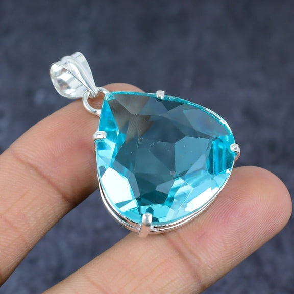 Adidev 30 Carat Blue Topaz Gemstone Triangle ShapeSky Blue Color 925 Sterling Silver Pendant for Women