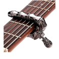 thumbnail image 1 of Cejilla Yashi con diseño de calavera y dedos para guitarra acústica, eléctrica y ukelele color negro, 1 of 5