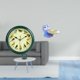 thumbnail image 2 of Reloj de pared con pájaro cantor, decorativo, musical, con sonido de pájaros, figura de oso, bandeja de gato, estatua de resina, ideal para dormitorio, 2 of 8