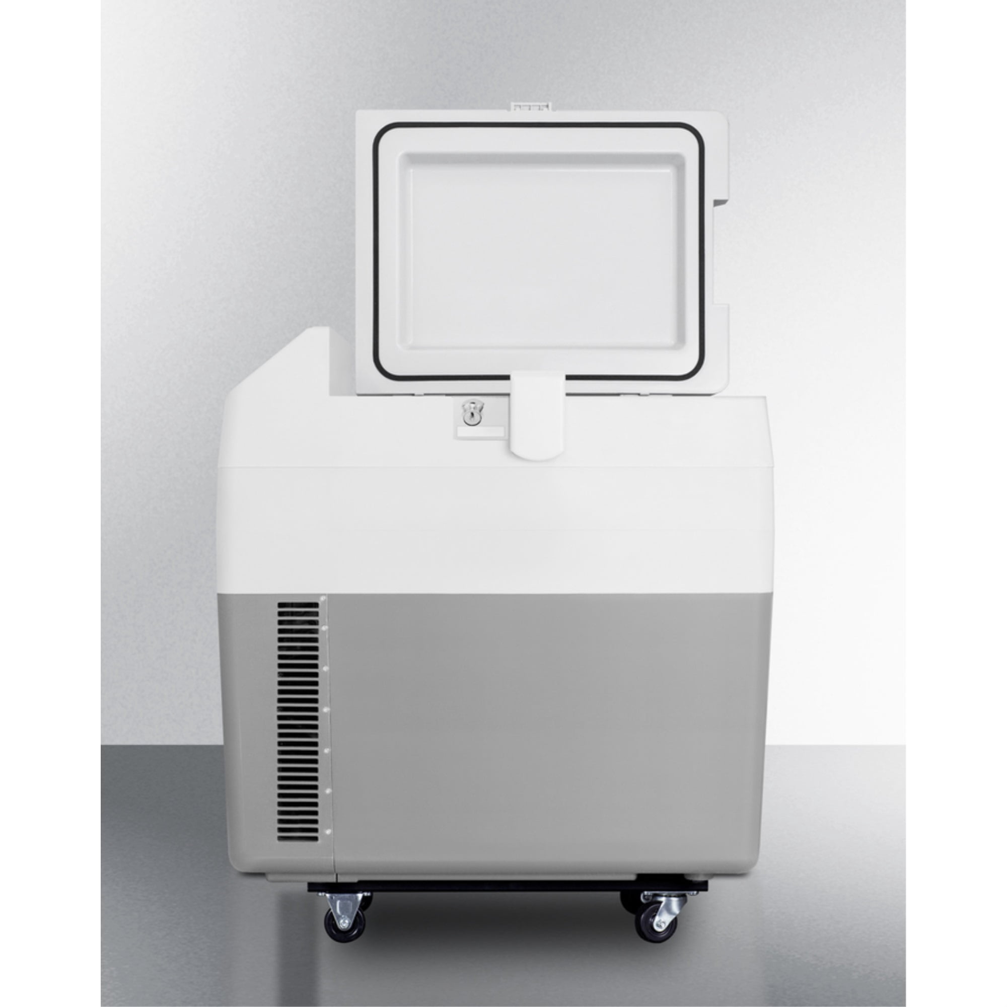 Portable 12V/24V medical cooler capable of operating at -12C or standard refrigerator temperatures, with lock and factory-installed wheels