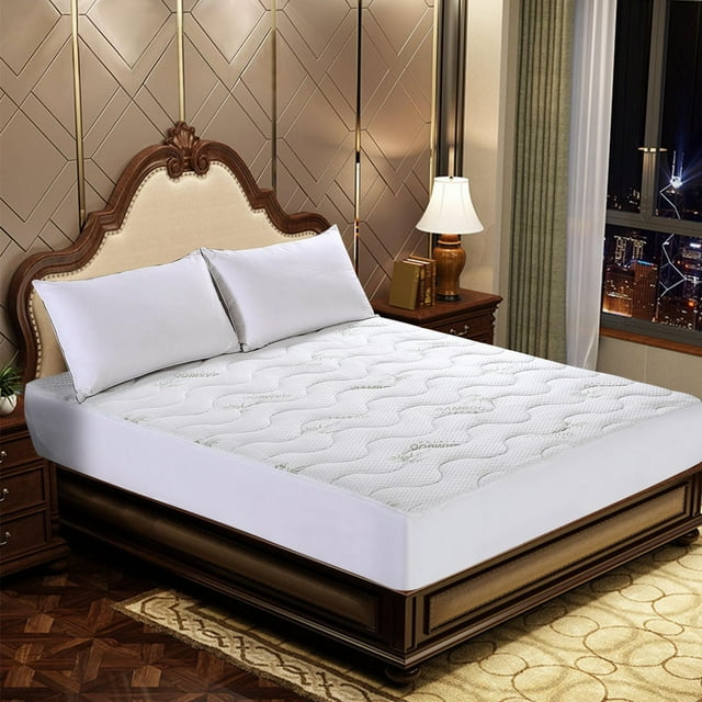luxury bed featuring a premium ultra soft quilted waterproof bamboo rayon fitted mattress pad with deep pockets on an 18-inch thick mattress