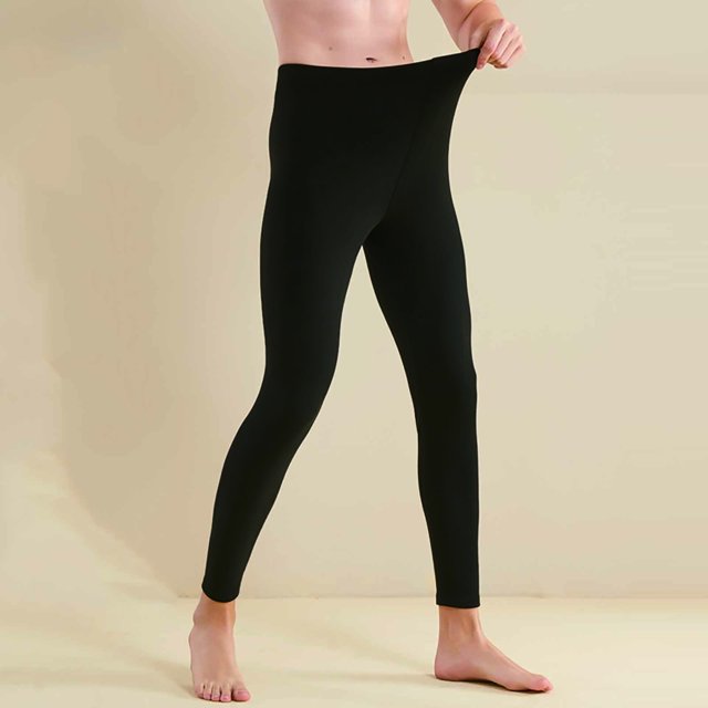 Pantalones térmicos de color liso para hombre con una capa interior cepillada y leggings para un look de hombre.