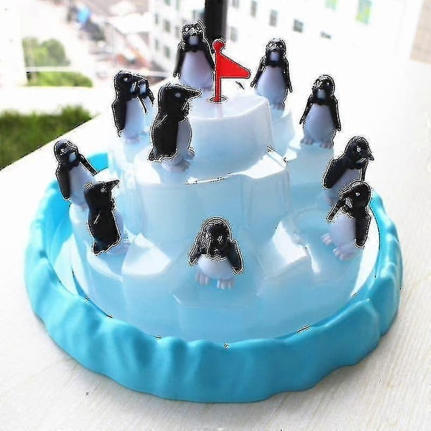 Juego de mesa interactivo de educación temprana para padres e hijos con pingüinos apilados en icebergs.