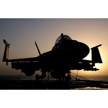 Navy Flight Deck - Silhouette of a US Navy FA-18E Super Hornet on the flight deck of USS Nimitz Canvas Art - Giovanni CollaStocktrek Images (35 x 24)