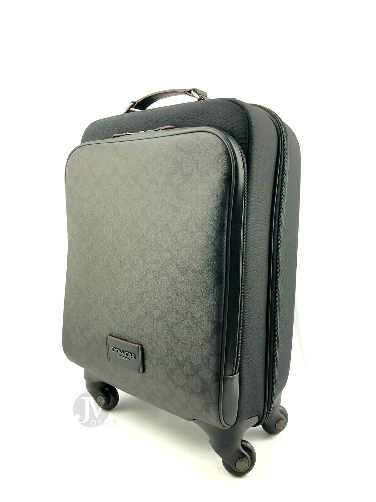 wheeled carry on in signature canvas