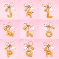 thumbnail image 2 of Golden Foil Orange Letter Keychain, 2 of 6