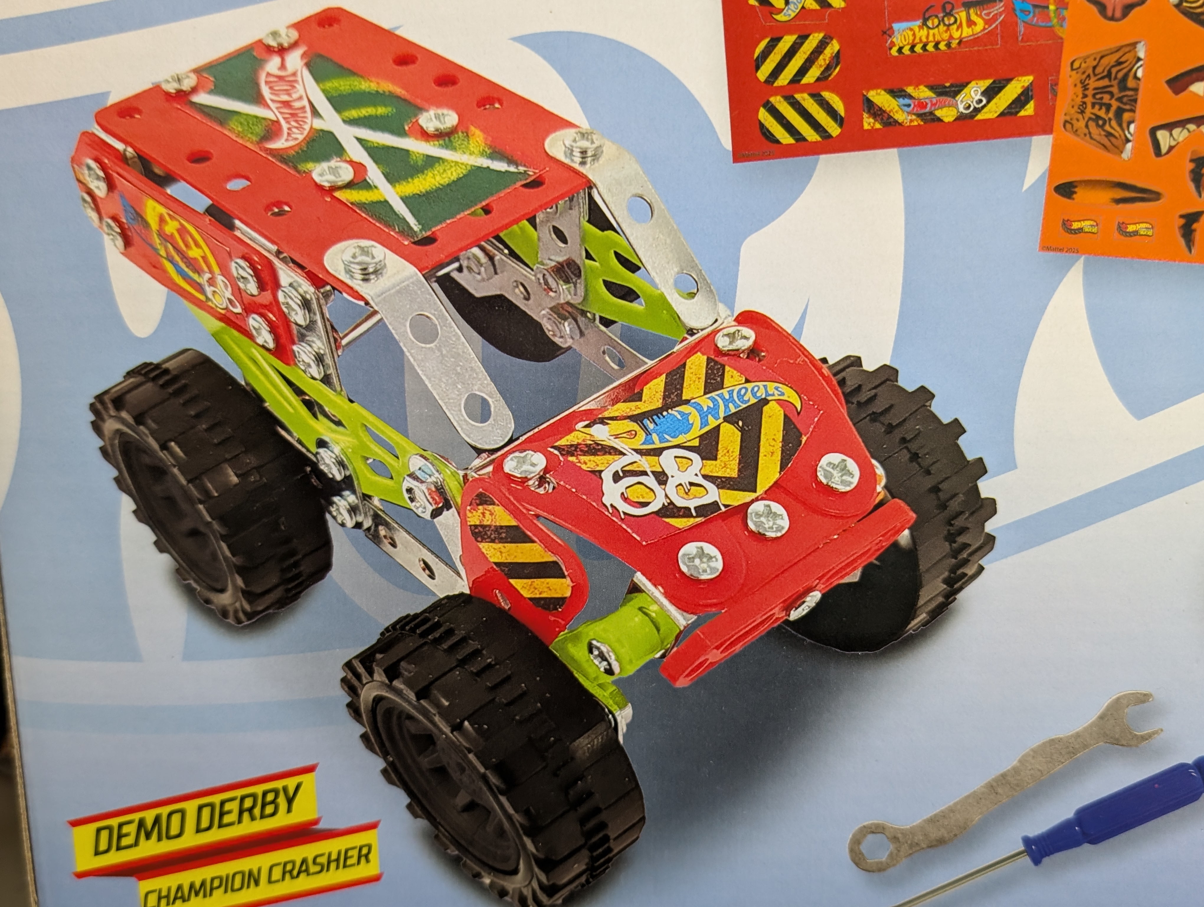 Hot Wheels Monster Trucks Build & Customize Metal Construction Kit, 2 Truck Set (Tiger Shark & Demo Derby), DIY Assembly Toy, Ages 6+