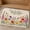 B, variant on XaaKee Welcome Mat, Stay Awhile Colorful Daisies Floral Welcome Mat, Non-Slip Rubber Backing Outdoor Mat for Front Door, 20x31inch