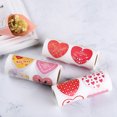 thumbnail image 4 of Adhesivos de papel en forma de corazón con mensajes románticos, ideales para San Valentín. Incluye 3 rollos para decorar regalos y expresar amor., 4 of 7