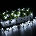 thumbnail image 4 of KOMI Solar Flower Lights,Waterproof 23ft/7M 50LED Peach Blossom Flower Solar Fairy Decorative String Lights for Outdoor Gardens Homes Wedding Christmas Party Lighting Decorations(White), 4 of 9