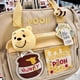 thumbnail image 3 of Nueva mochila portátil de gran capacidad con diseño de oso de abeja original de Winnie The Pooh Kawaii, bolso de un solo hombro, regalos bonitos de dibujos animados para niñas, 3 of 5