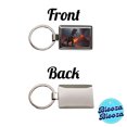 thumbnail image 4 of Tyrannosaurus T-Rex Dinosaur Volcano Erupting Metal Rectangle Keychain, 4 of 7