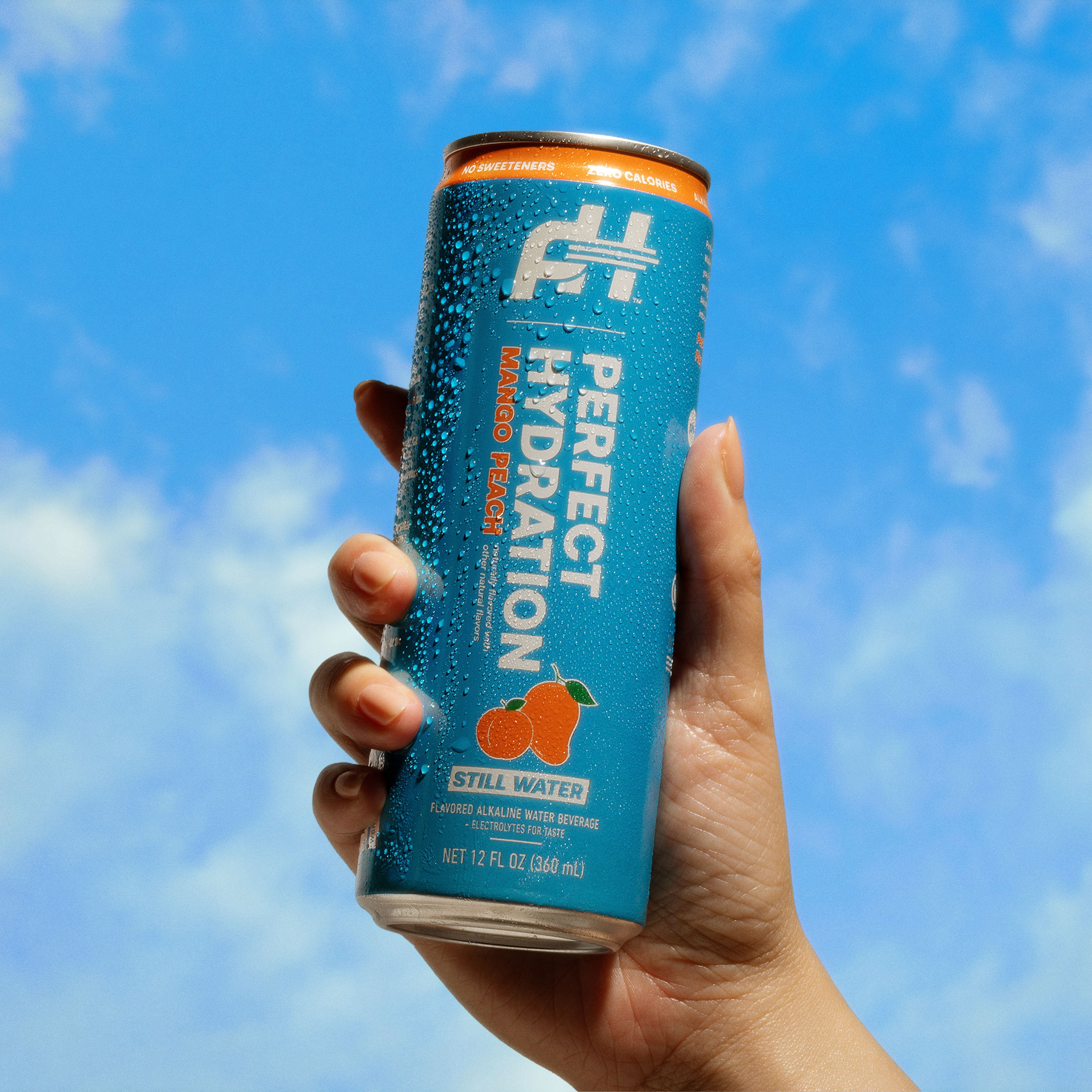 Perfect Hydration Mango Peach Flavored Alkaline Water, 0 Sugar, 0 Calories, 12 oz cans, Pack of 12