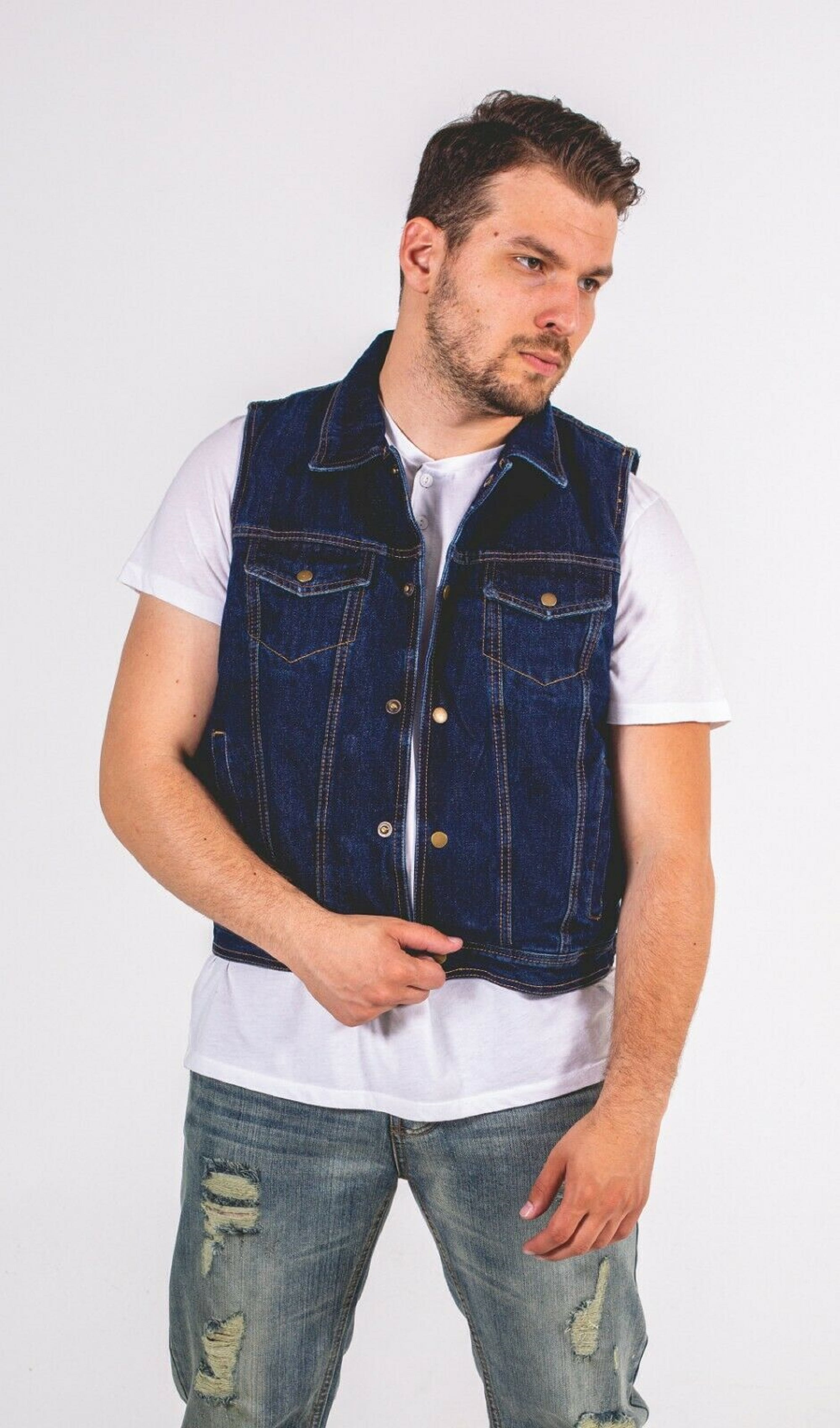 men's style vest and jeans