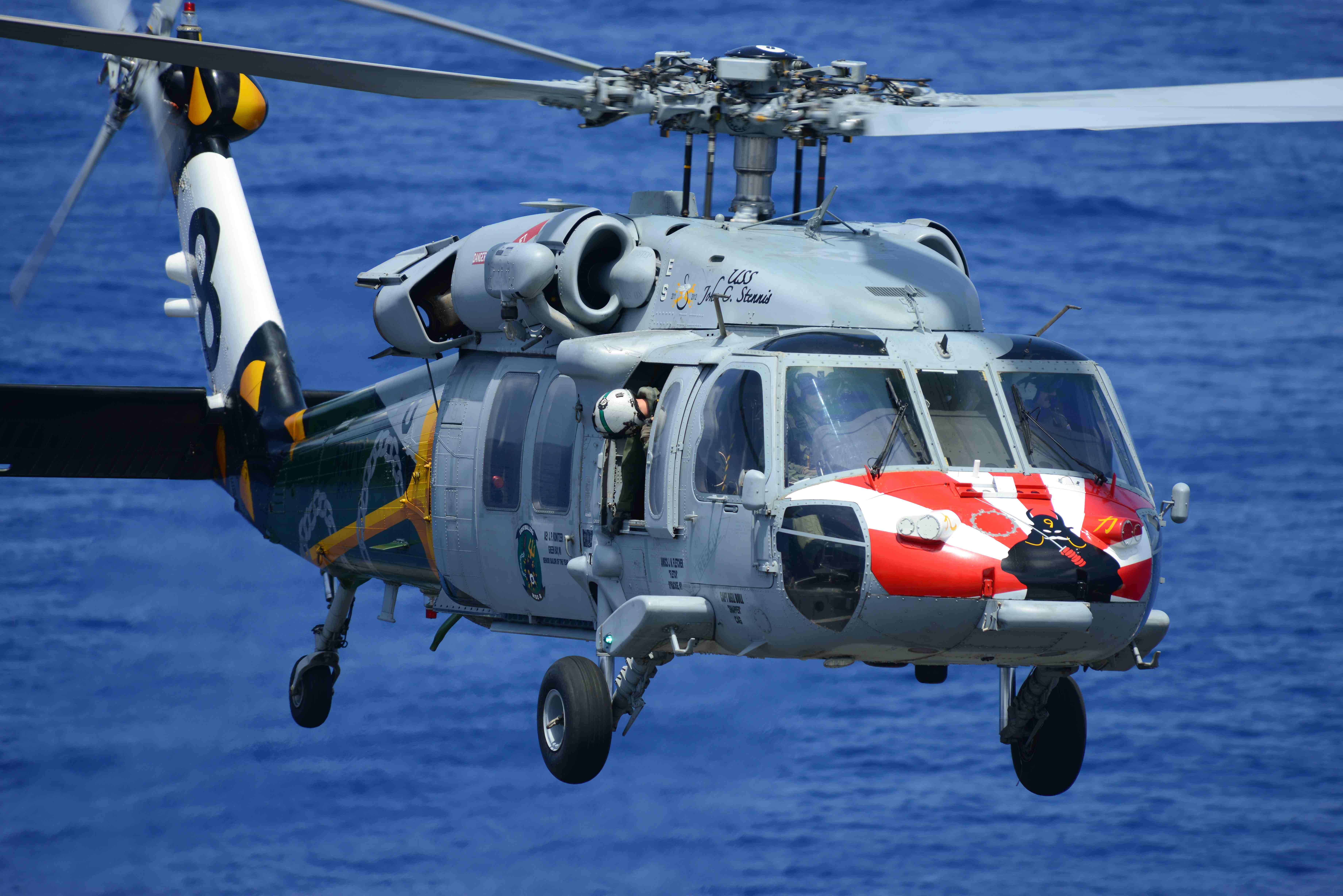 LAMINATED POSTER An MH60S Sea Hawk helicopter from the Eightballers of