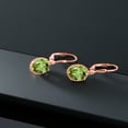 thumbnail image 4 of Gem Stone King 18K Rose Gold Plated Silver Green Peridot Leverback Dangle Earrings for Women (4.20 Cttw, Gemstone August Birthstone, Oval 9X7MM), 4 of 5