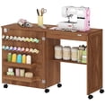 thumbnail image 1 of Folding Sewing Machine Table with Storage - Brown Craft Table on Wheels for Living Room, Bedroom & Home Office - Compact Cabinet Design with 18 Pegs & Shelf, 1 of 7