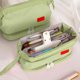 thumbnail image 1 of Organizador de bolsa de papelería de gran capacidad • Bolsa de maquillaje multicapa • Almacenamiento portátil con cremallera para suministros de oficina, viajes y cosméticos, 1 of 6