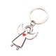 thumbnail image 1 of Llavero con forma de ángel plateado con detalle de corazón rojo, 3 x 6 cm, 1 of 3