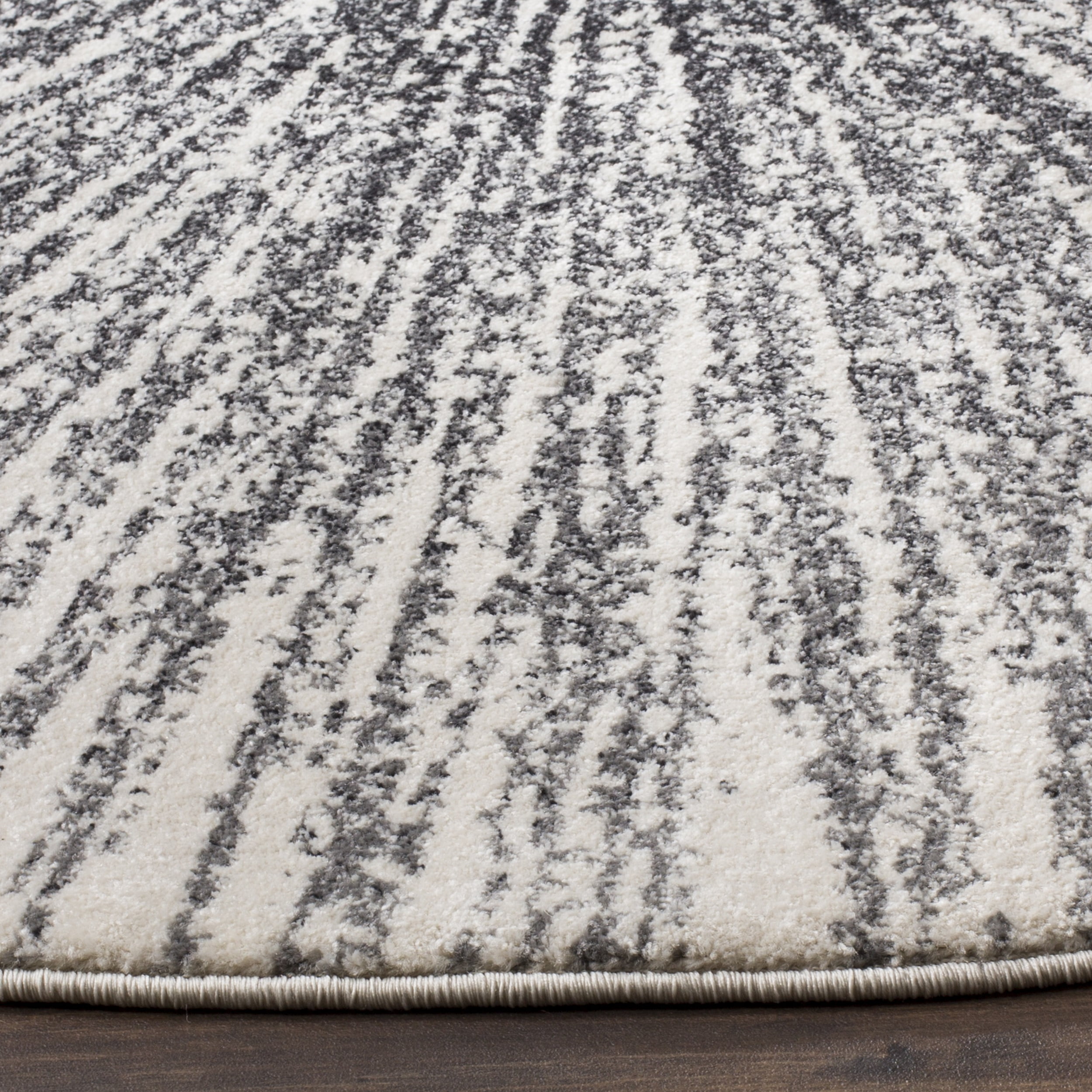 SAFAVIEH Evoke Vana Abstract Area Rug, Black/Ivory, 6'7" x 6'7" Round