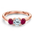 thumbnail image 3 of Gem Stone King 18K Rose Gold Plated Silver Sky Blue Topaz and Red Created Ruby Engagement Ring for Women | 1.20 Cttw | Round 5MM | Gemstone November Birthstone | Size 6, 3 of 6