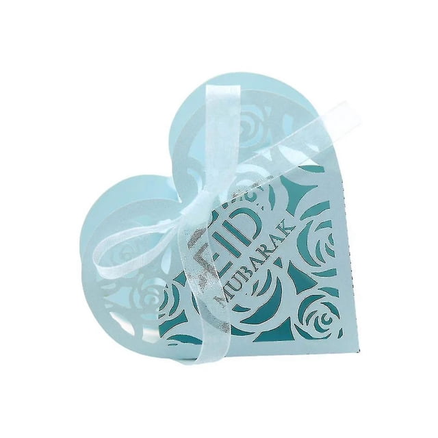 50 cajas de regalo para dulces eid mubarak: caja azul en forma de corazón con corte floral y texto EID MUBARAK, vista frontal 3/4, plegada y atada con lazo de organza blanco; ideal para chocolates, souvenirs de Eid, decoraciones de Ramadán y recuerdos de boda.