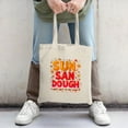 thumbnail image 2 of Vibrant Canvas Tote Bag with " SUN SAN DOUGH " in bold colors whimsical phrase and decorative stars & leaves Perfect for shopping, 2 of 4