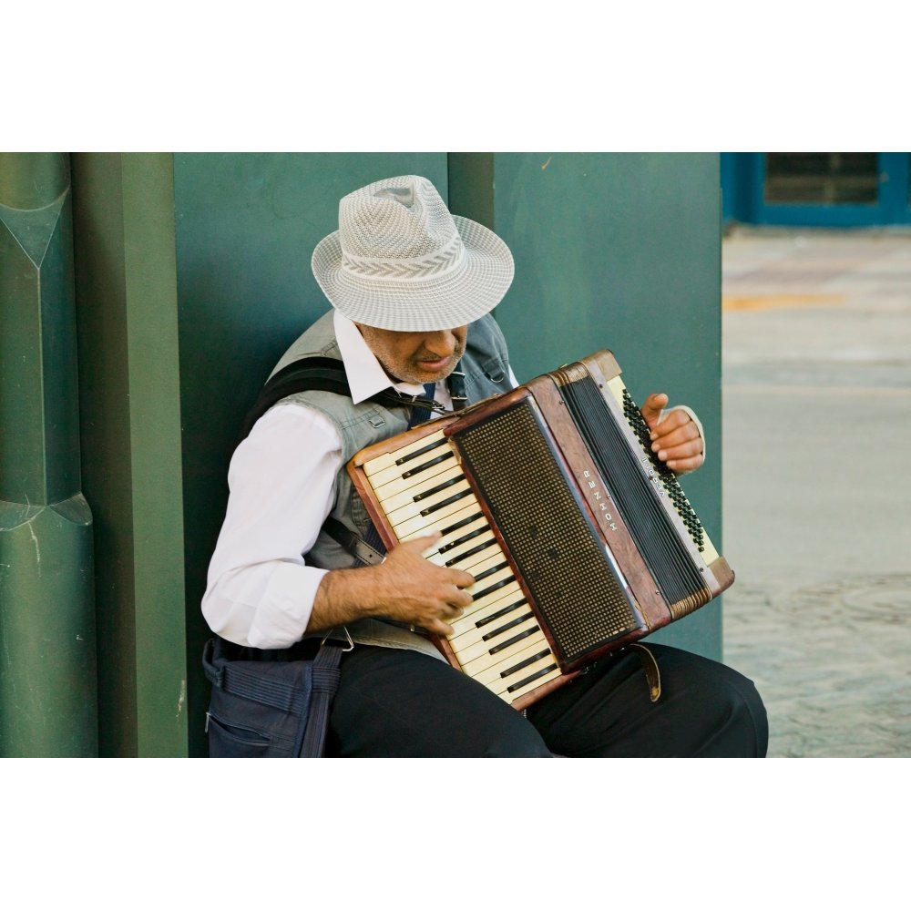 Male accordion player in town center of Sevilla Andalucia Southern