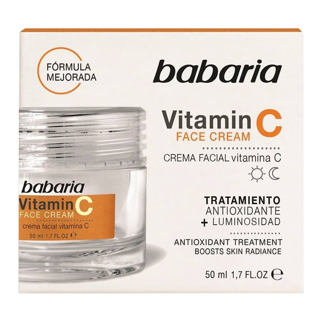 crema facial babaria vitamina c 50 ml Tarro de vidrio transparente con tapa plateada y etiqueta naranja junto a caja blanca con logo Babaria; leyendas visibles de "Vitamin C" y "Tratamiento antioxidante + luminosidad", protección frente a luz azul y polución, contenido 50 ml. Recomendada para pieles grasas y uso diario; a menudo se utiliza junto con el sérum de Vitamina C para potenciar resultados.