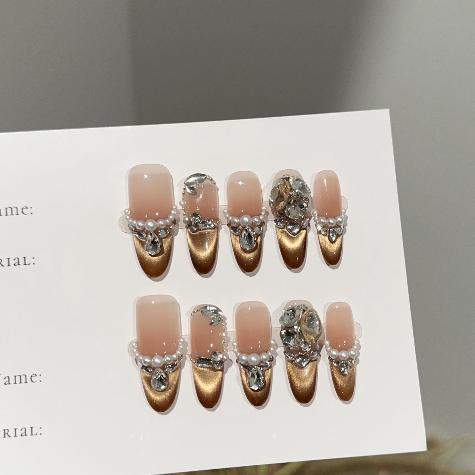 Purely handmade wear nail pads, advanced sense autumn and winter brown cat's eye nail pads, pearl diamond fake nail patches wholesale