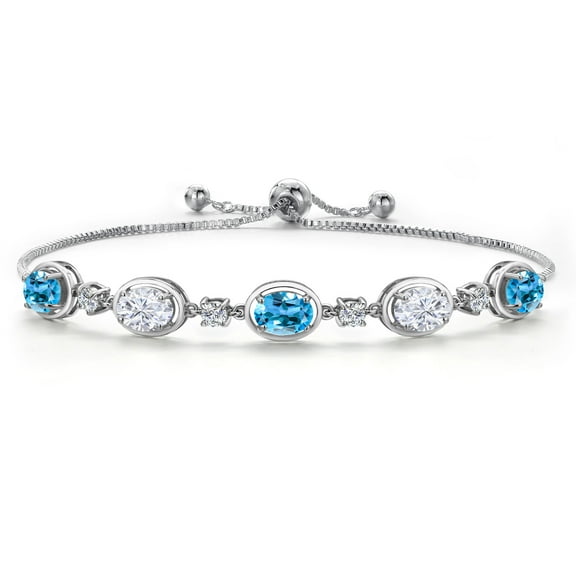 Gem Stone King 925 Sterling Silver Swiss Blue Topaz and White Moissanite Bracelet for Women | 4.80 Cttw | Gemstone November Birthstone | Oval 7X5MM | Fully Adjustable 9 inch