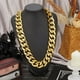 thumbnail image 3 of Collar de plástico dorado con eslabones cubanos de estilo hip hop, de 36 pulgadas, artificial, dorado, grueso, estilo punk de los años 80 y 90, con diseño de rapero., 3 of 5