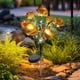 thumbnail image 5 of Lámpara solar de exterior con forma de peonía, 7 luces LED de simulación, resistente al agua, para decoración de jardines, caminos, patios y terrazas. Lámpara de pie de plástico., 5 of 6