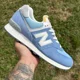 thumbnail image 1 of New Balance 574 Blue Laguna White U574RCA Men’s Size 9 Medium, 1 of 6